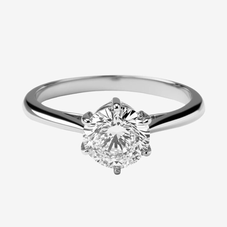 a white gold ring with an oval cut diamond