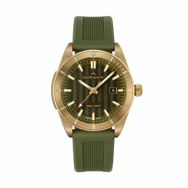 a watch with a green strap and gold numbers
