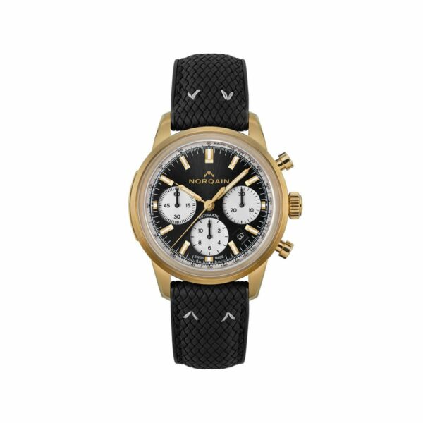 a gold watch with black leather straps