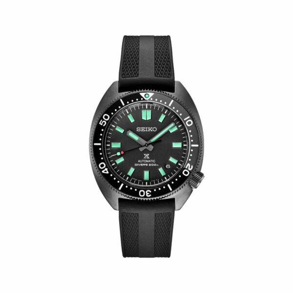a black watch with green numbers on the face
