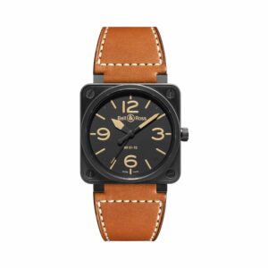 a black and tan watch with brown straps
