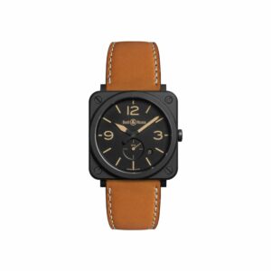 a black and tan watch with brown straps