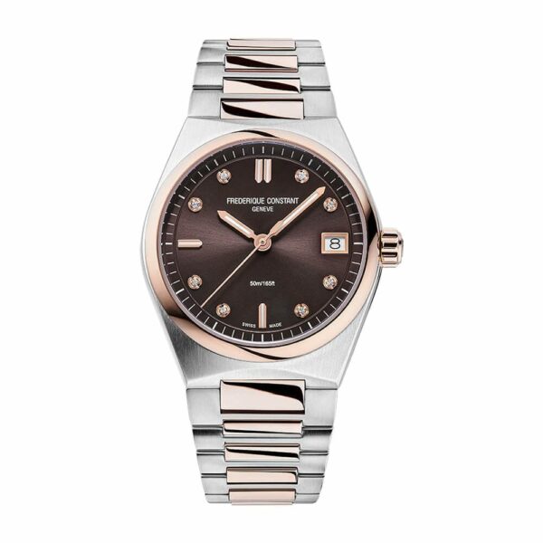 a watch with a black dial and two tone bracelet